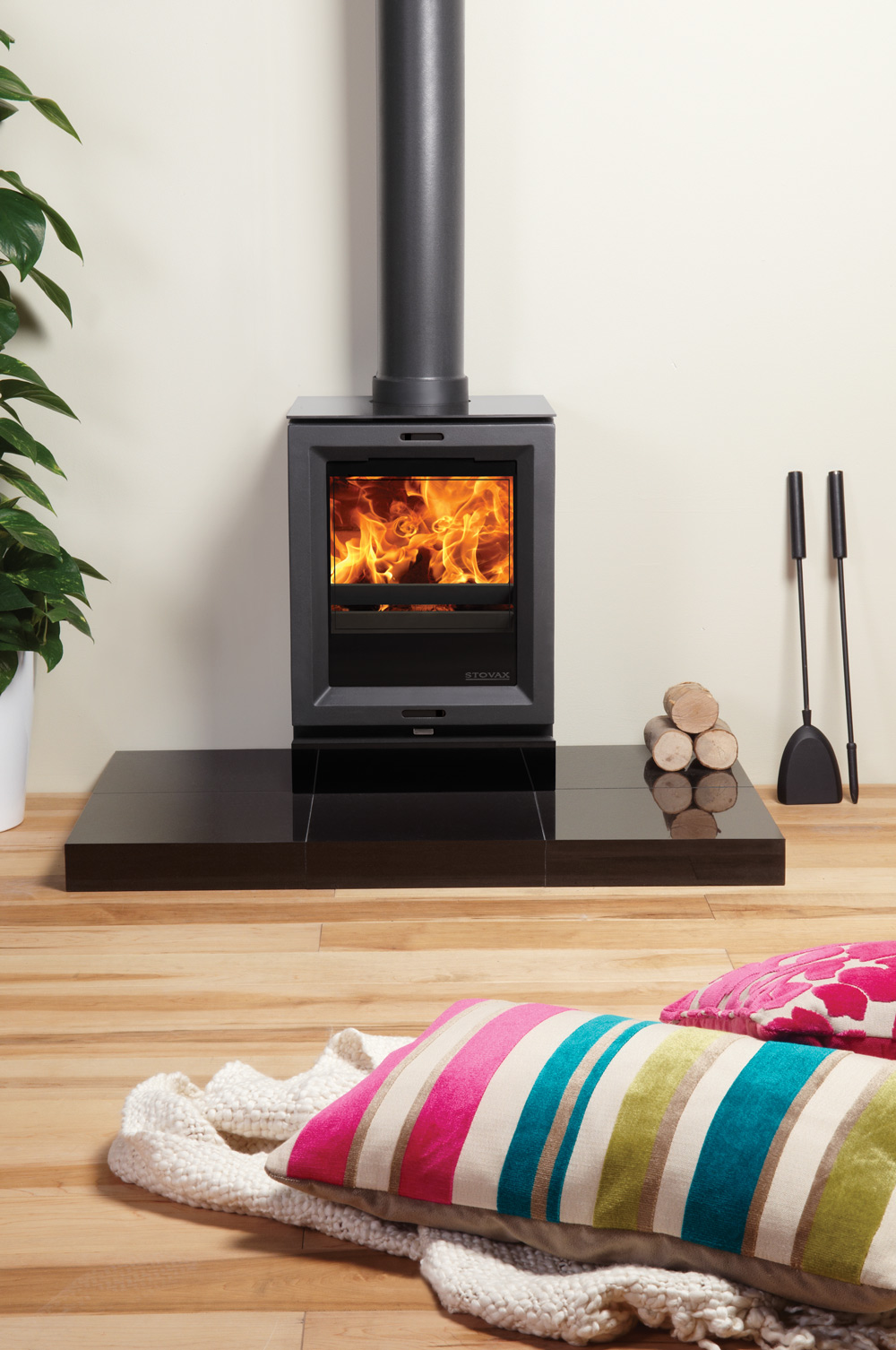 Stovax View 3 multifuel stove, burning logs.