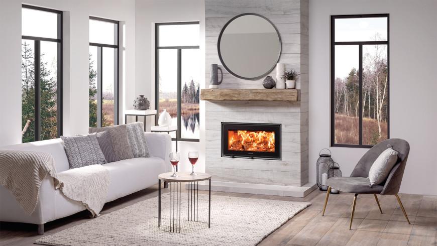 Romantic log burner with glasses of wine
