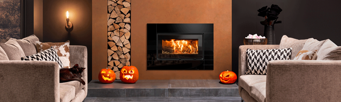 Halloween spooky home with classy decor and log burner. Halloween home décor ideas for 2023