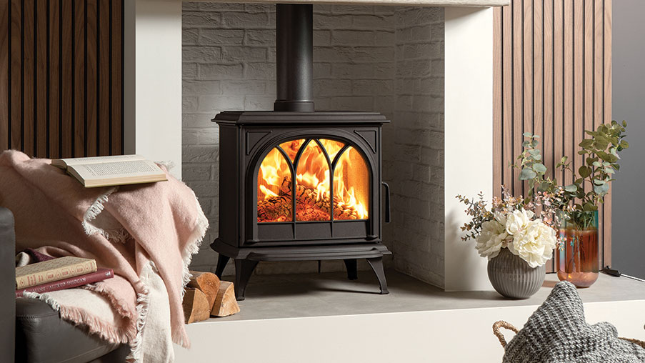 Stovax Huntingdon 30 wood burning Ecodesign stove, with Tracery Door, shown with ceramic wood effect beam