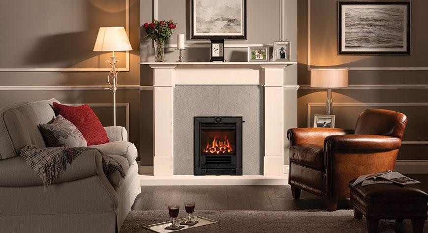 Gazco Logic™ HE gas fire with Coal-effect fuel bed, shown with Winchester complete front in Matt Black with Slide Control. Also shown: Claremont Stone mantel from Stovax.