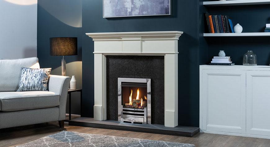 Logic HE conventional flue fire with log-effect and Polished Chrome-effect Arts front. Shown with white Pembroke wooden mantel.