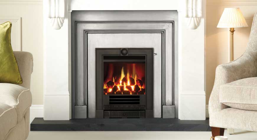 Gazco Logic™ Hotbox fire with Coal-effect fuel bed, shown with Winchester complete front in Matt Black with Slide Control. Also shown: Victorian Corbel Limestone mantel and Fully Polished London Front with insert panel from Stovax.