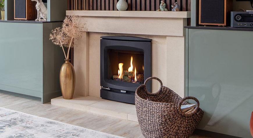 Logic HE conventional flue fire with log-effect and Vogue Inset front.