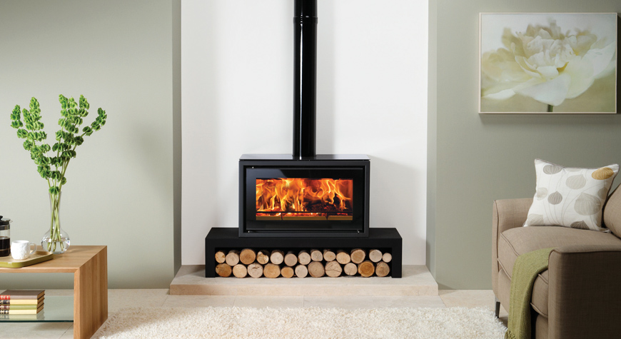 Stovax Studio1 Freestanding wood burning stove on 120 Low Bench with Black Glass Top Plate and Gloss Black enamelled flue pipe.