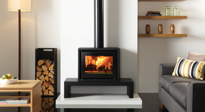 Stovax Studio 500 Freestanding stove on a 100 Low Bench. Also shown: Medium log holder  also available from Stovax.