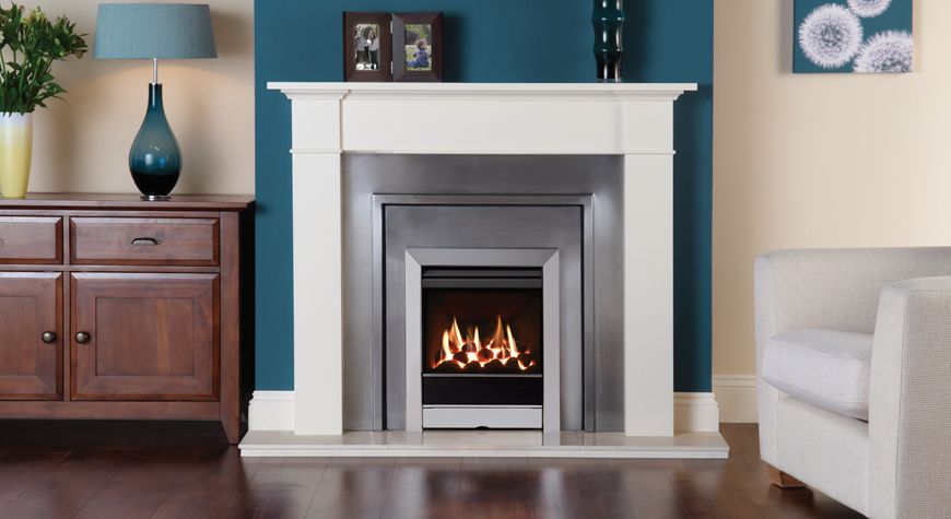 Gazco Logic™ HE Balanced flue fire with Coal-effect fuel bed and Tempo front in Polished Stainless. Also Shown: Brompton Mantel and Chelsea Cast Iron front with inset panel available from Stovax. (GB Patent application no: 1108451.4)